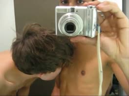 2 friends wanking in the restroom